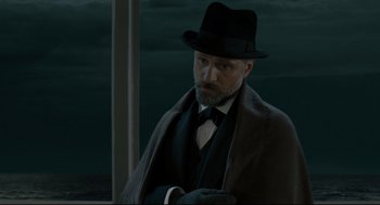 Movie still from “A Dangerous Method” (2011), directed by David Cronenberg – An old man in a hat and a coat; Medium shot, Low angle