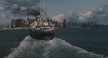 Movie still from “A Dangerous Method” (2011), directed by David Cronenberg – A large boat in the water near a city; Extreme Wide shot, High angle