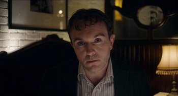 Movie still from “A Date for Mad Mary” (2016), directed by Darren Thornton – A person wearing a jacket; Close Up shot, Over the shoulder angle
