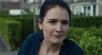 Movie still from “A Date for Mad Mary” (2016), directed by Darren Thornton – A person wearing a blue shirt; Close Up shot, Over the shoulder angle