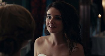 Movie still from “A Date for Mad Mary” (2016), directed by Darren Thornton – A beautiful young lady wearing a white dress; Close Up shot, Over the shoulder angle