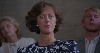 Movie still from “A Fish Called Wanda” (1988), directed by Charles Crichton – A person with short hair; Close Up shot, Low angle