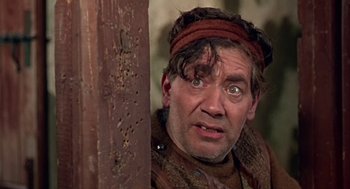 Movie still from “A Funny Thing Happened on the Way to the Forum” (1966), directed by Richard Lester – A person wearing a headband; Close Up shot, Low angle