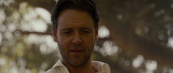Movie still from “A Good Year” (2006), directed by Ridley Scott – A person wearing a white shirt; Close Up shot, Low angle