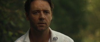 Movie still from “A Good Year” (2006), directed by Ridley Scott – A person wearing a white shirt; Close Up shot, Over the shoulder angle