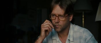 Movie still from “A Good Year” (2006), directed by Ridley Scott – A person wearing glasses; Close Up shot, Low angle