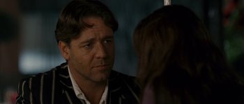 Movie still from “A Good Year” (2006), directed by Ridley Scott – A person talking to another person; Close Up shot, Over the shoulder angle