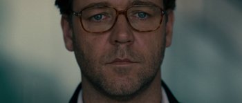 Movie still from “A Good Year” (2006), directed by Ridley Scott – A person wearing glasses; Close Up shot, Low angle
