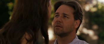 Movie still from “A Good Year” (2006), directed by Ridley Scott – A man and a woman talking to each other; Close Up shot, Over the shoulder angle