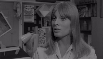 Movie still from “A Hard Day's Night” (1964), directed by Richard Lester – Black and white photograph of a woman with long blonde hair; Close Up shot, Low angle