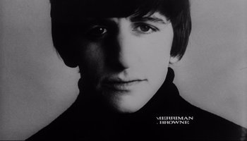 Movie still from “A Hard Day's Night” (1964), directed by Richard Lester – A black - and - white photograph of a young man; Close Up shot, High angle