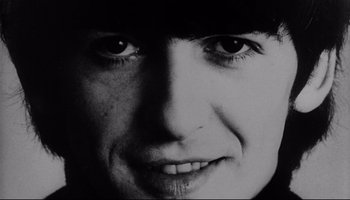 Movie still from “A Hard Day's Night” (1964), directed by Richard Lester – A black and white photo of a woman's face; Extreme Close Up shot, Low angle