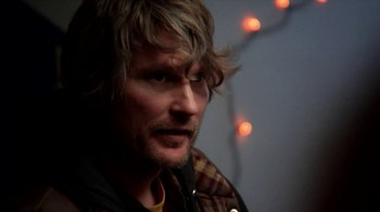 Movie still from “A Horrible Way to Die” (2010), directed by Adam Wingard – A person wearing a jacket; Close Up shot, Over the shoulder angle