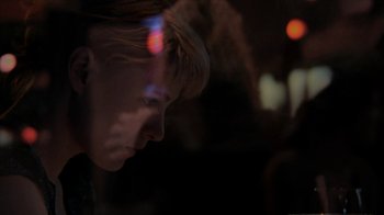 Movie still from “A Horrible Way to Die” (2010), directed by Adam Wingard – A woman is looking down at her face; Close Up shot, Low angle