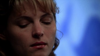 Movie still from “A Horrible Way to Die” (2010), directed by Adam Wingard – A person with closed eyes; Close Up shot, Low angle