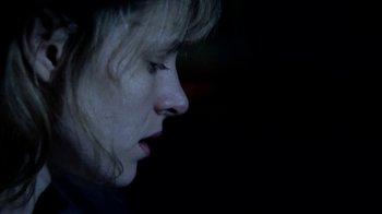 Movie still from “A Horrible Way to Die” (2010), directed by Adam Wingard – A person's face in the dark; Extreme Close Up shot, Low angle