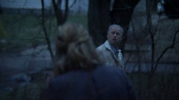 Movie still from “A Horrible Way to Die” (2010), directed by Adam Wingard – A man and a woman in the woods at night; Medium shot, Over the shoulder angle