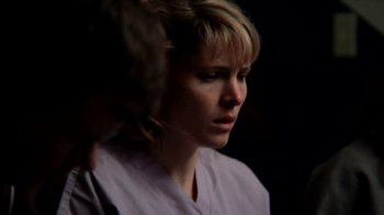Movie still from “A Horrible Way to Die” (2010), directed by Adam Wingard – A woman with blonde hair wearing a purple shirt; Close Up shot, Over the shoulder angle
