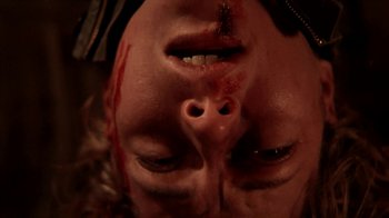Movie still from “A Horrible Way to Die” (2010), directed by Adam Wingard – A man with a head wound and a nose bleed; Extreme Close Up shot, Overhead angle