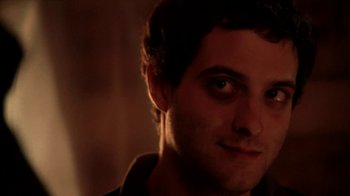 Movie still from “A Horrible Way to Die” (2010), directed by Adam Wingard – A man's face in a dark room; Close Up shot, High angle