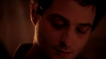 Movie still from “A Horrible Way to Die” (2010), directed by Adam Wingard – A man's face in the dark; Close Up shot, High angle