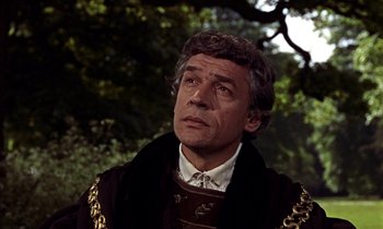 Movie still from “A Man for All Seasons” (1966), directed by Fred Zinnemann – A person wearing a suit and tie; Close Up shot, Low angle