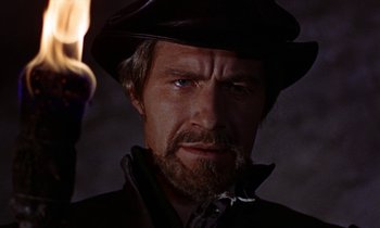 Movie still from “A Man for All Seasons” (1966), directed by Fred Zinnemann – A person wearing a hat; Close Up shot, Over the shoulder angle