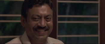 Movie still from “A Mighty Heart” (2007), directed by Michael Winterbottom – A person with a beard and mustache; Close Up shot, Low angle