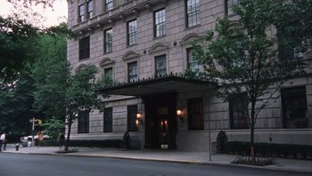 Movie still from “A Mighty Wind” (2003), directed by Christopher Guest – A large building with a large entrance way; Extreme Wide shot, Low angle