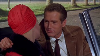 Movie still from “A New Kind of Love” (1963), directed by Melville Shavelson – A man and a woman are talking to each other; Close Up shot, Over the shoulder angle