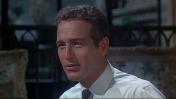 Movie still from “A New Kind of Love” (1963), directed by Melville Shavelson – A person wearing a shirt and a tie; Close Up shot, Low angle