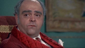 Movie still from “A New Leaf” (1971), directed by Elaine May – A man in a red jacket and a white shirt; Close Up shot, Over the shoulder angle