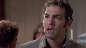 Movie still from “A New Leaf” (1971), directed by Elaine May – A person wearing a jacket; Close Up shot, Low angle