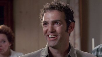 Movie still from “A New Leaf” (1971), directed by Elaine May – A person smiling; Close Up shot, Low angle