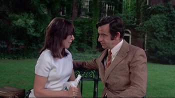 Movie still from “A New Leaf” (1971), directed by Elaine May – A man and a woman talking to each other outside; Medium shot, High angle
