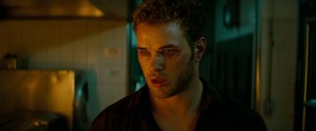 Movie still from “A Nightmare on Elm Street” (2010), directed by Samuel Bayer – A person wearing a black shirt; Close Up shot, Over the shoulder angle