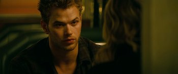 Movie still from “A Nightmare on Elm Street” (2010), directed by Samuel Bayer – A man sitting in front of a woman in front of a mirror; Close Up shot, Over the shoulder angle