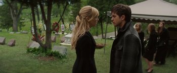 Movie still from “A Nightmare on Elm Street” (2010), directed by Samuel Bayer – A man and a woman standing next to each other in a cemetery; Medium shot, Over the shoulder angle