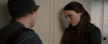 Movie still from “A Nightmare on Elm Street” (2010), directed by Samuel Bayer – A young man and a young woman standing next to each other in front of a wall; Close Up shot, Over the shoulder angle