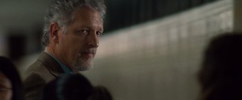 Movie still from “A Nightmare on Elm Street” (2010), directed by Samuel Bayer – An older man with grey hair looking at the camera; Close Up shot, Over the shoulder angle