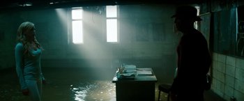 Movie still from “A Nightmare on Elm Street” (2010), directed by Samuel Bayer – A room flooded with water and sunlight coming through the window; Wide shot, High angle