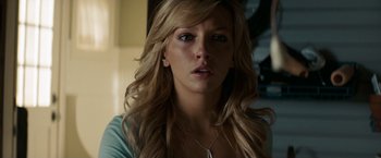 Movie still from “A Nightmare on Elm Street” (2010), directed by Samuel Bayer – A woman with long blonde hair wearing a necklace; Close Up shot, Low angle