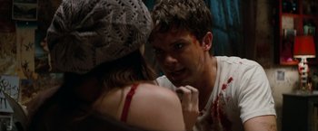 Movie still from “A Nightmare on Elm Street” (2010), directed by Samuel Bayer – A man looking into a woman's face in the mirror; Close Up shot, Over the shoulder angle