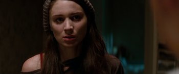 Movie still from “A Nightmare on Elm Street” (2010), directed by Samuel Bayer – A woman with long brown hair wearing a brown shirt; Close Up shot, Over the shoulder angle