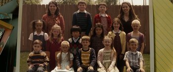 Movie still from “A Nightmare on Elm Street” (2010), directed by Samuel Bayer – A group of children and their teacher posing for a picture; Wide shot, High angle