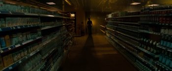 Movie still from “A Nightmare on Elm Street” (2010), directed by Samuel Bayer – A man is standing in a grocery store aisle; Wide shot, Low angle