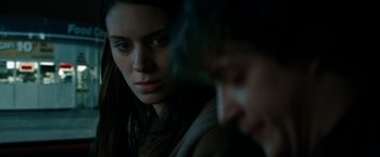 Movie still from “A Nightmare on Elm Street” (2010), directed by Samuel Bayer – A woman and a man looking at each other in the dark; Close Up shot, Over the shoulder angle