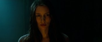 Movie still from “A Nightmare on Elm Street” (2010), directed by Samuel Bayer – A woman with long dark hair stares at the camera; Close Up shot, Low angle