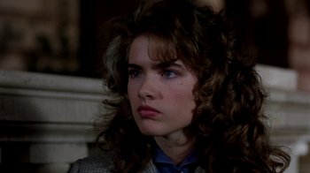 Movie still from “A Nightmare on Elm Street 3: Dream Warriors” (1987), directed by Chuck Russell – A person wearing a suit and tie; Close Up shot, Over the shoulder angle