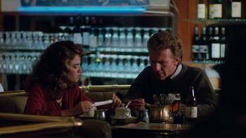 Movie still from “A Nightmare on Elm Street 3: Dream Warriors” (1987), directed by Chuck Russell – A man and a woman sitting at a table in a restaurant; Medium shot, Over the shoulder angle